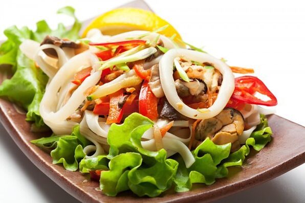 Seafood salad with ginger dressing is a healthful dish that increases potency