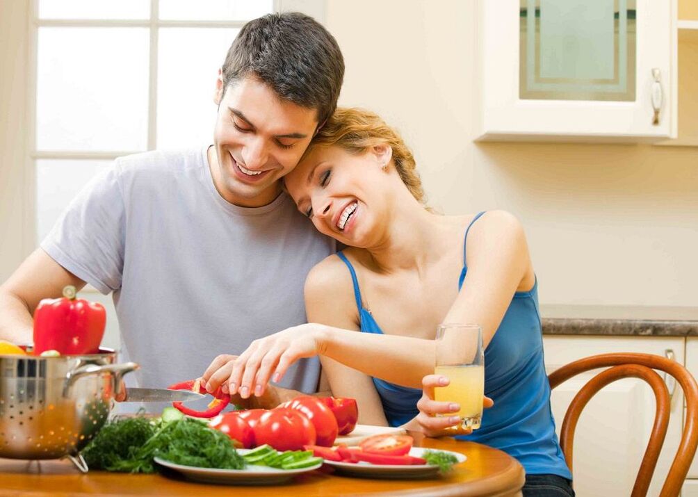 woman and man preparing vegetables to increase power